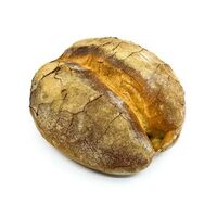 Das in der Mitte eingedrückte Brot zeichnet sich durch die dunkel gebackene Kruste aus und die luftige Krume.